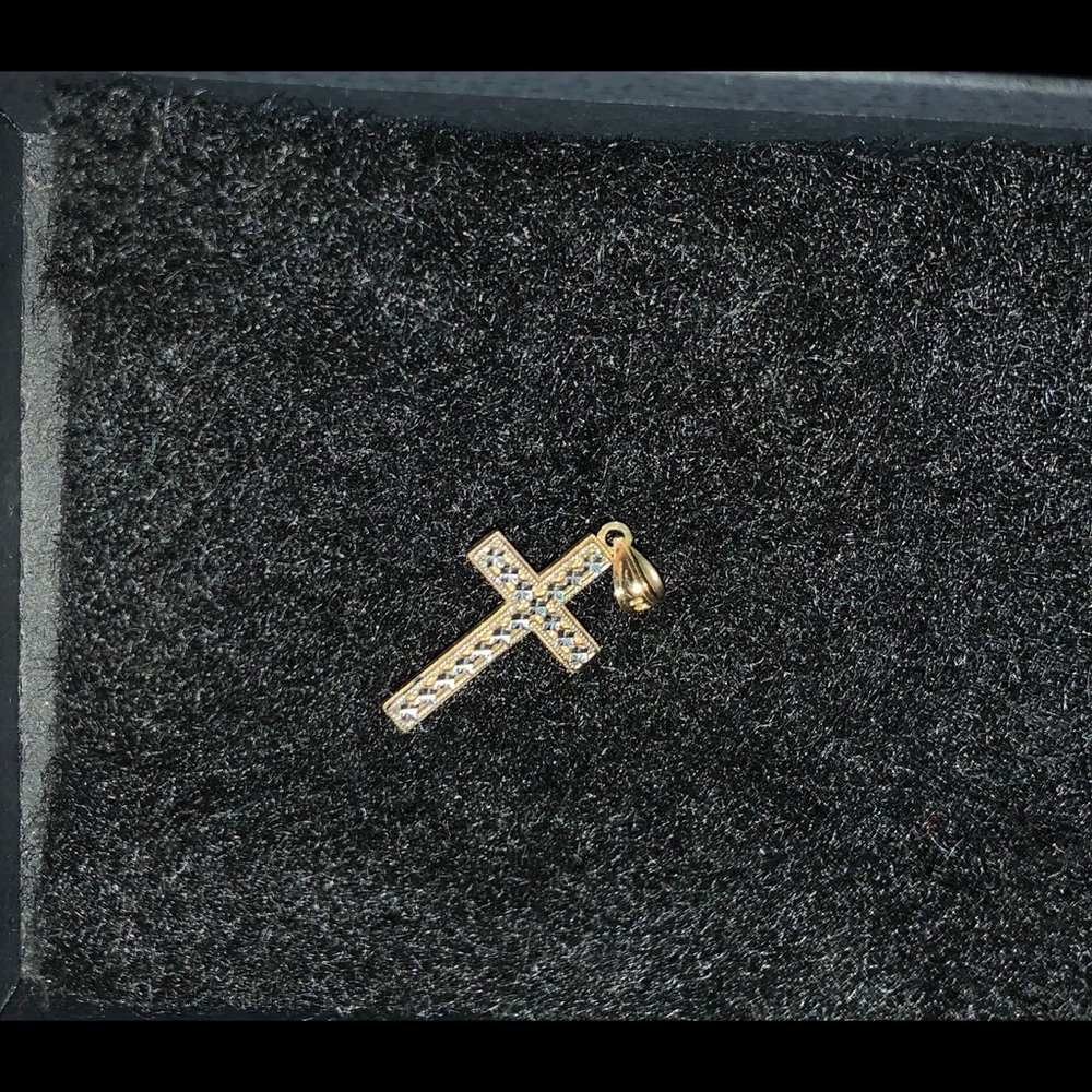 Double sided 14kt gold cross pendent.